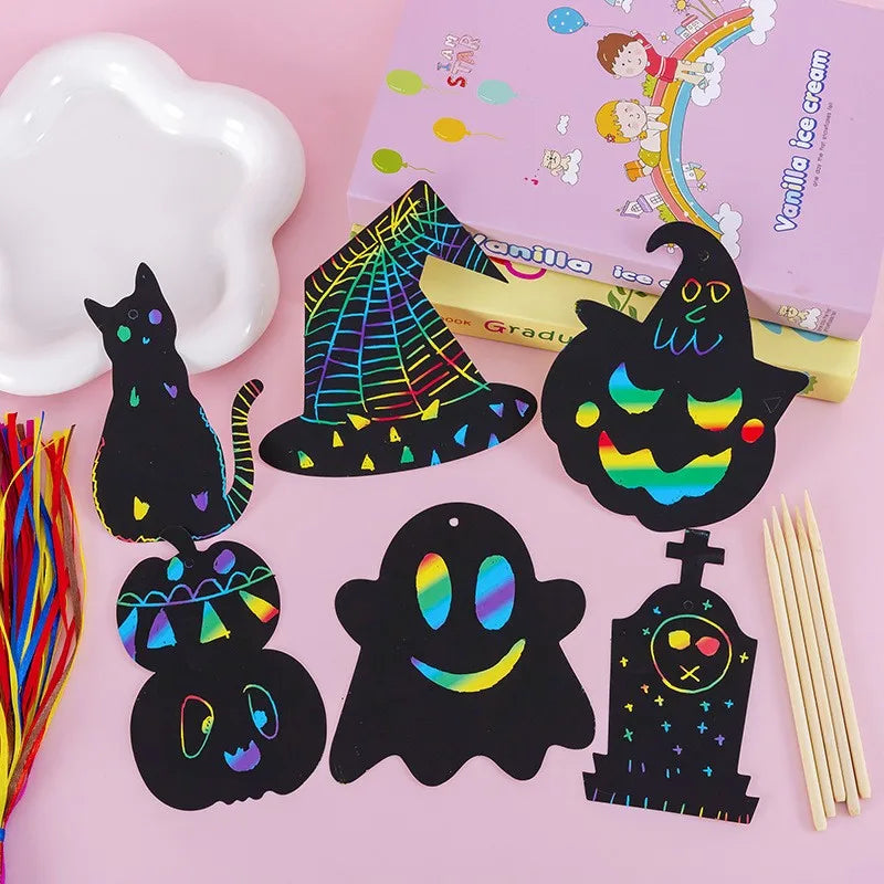 A set of black Halloween-themed scratch art cards featuring colorful rainbow designs and a purple vanilla ice cream box.