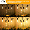 Outdoor LED string lights illuminating yellow flowers in a garden setting.