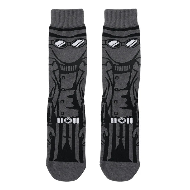 Pair of dark gray novelty crew socks featuring skull, alien, and tiger prints.