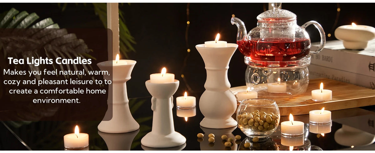 A collection of natural beeswax tealight candles displayed on a wooden surface with greenery and decorative elements.