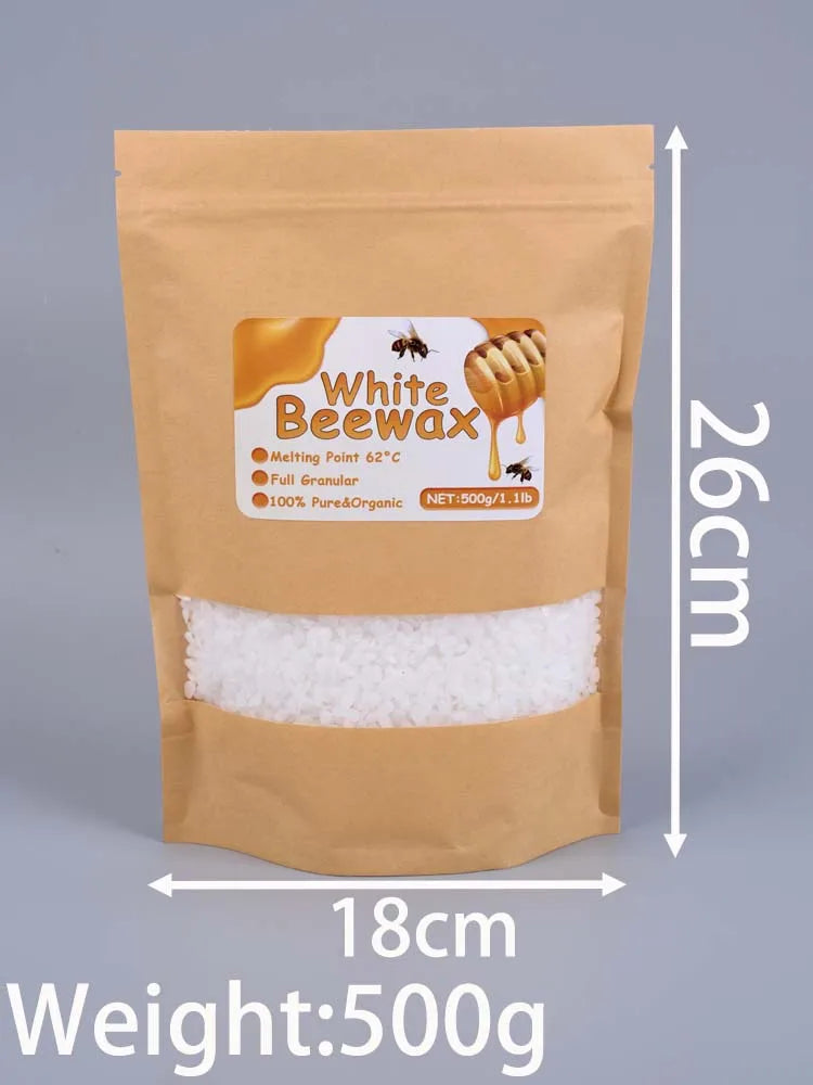A brown paper bag containing 500g of white beeswax pellets for DIY candle making