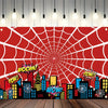 A vibrant red spiderweb design with a city skyline silhouette in black and yellow against a white background.