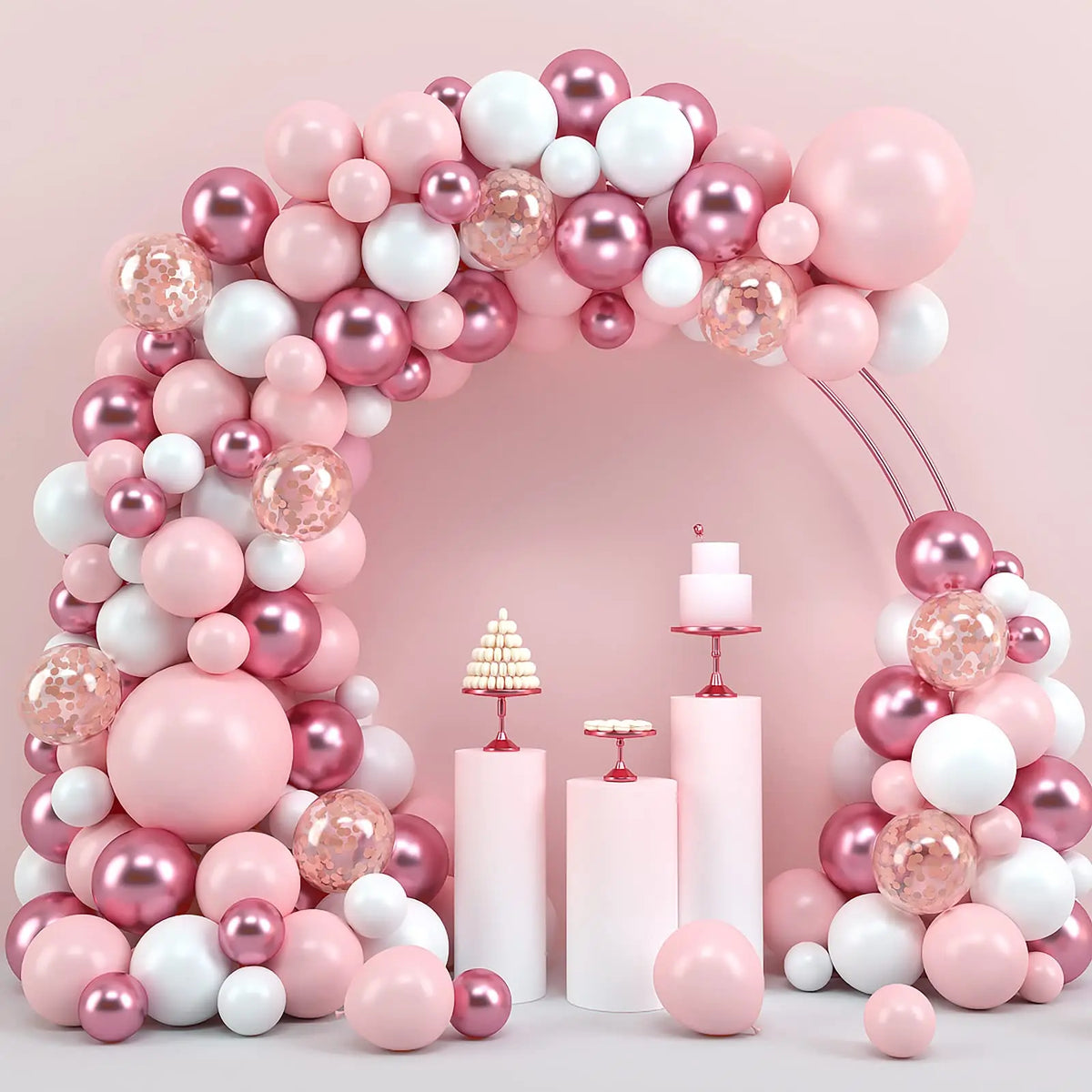 A large archway decorated with pink and white latex balloons for celebrations.