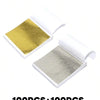 Two sheets of edible gold leaf flakes for baking and cake decoration displayed on a white background.