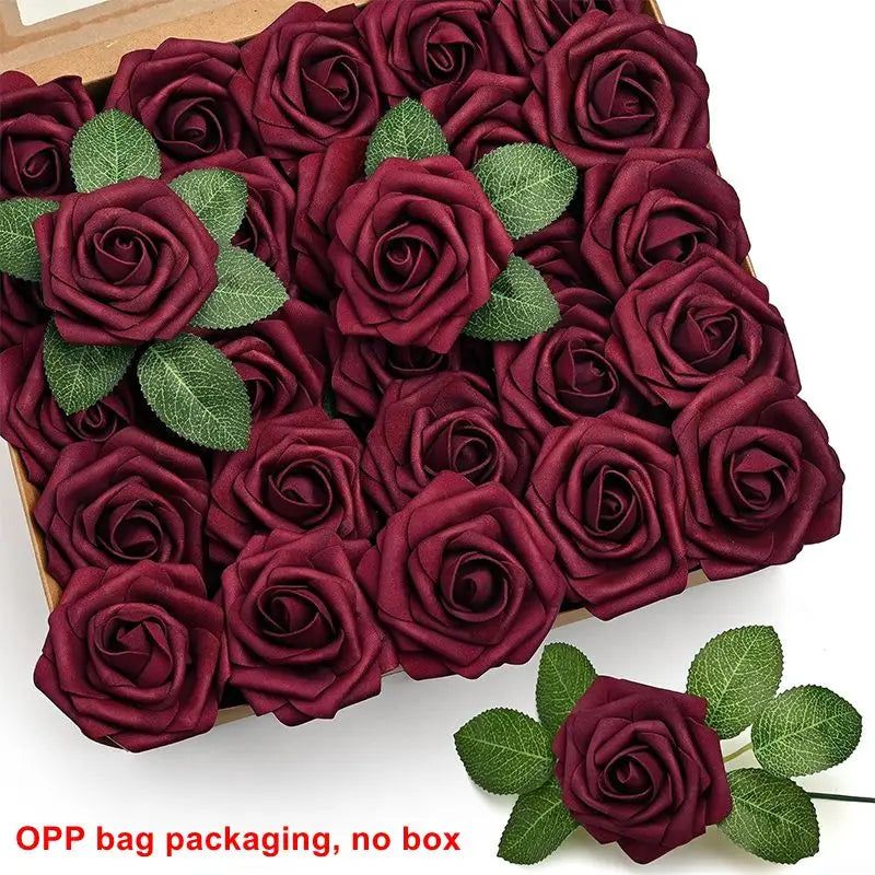 A box of deep burgundy foam rose flowers with green leaves for DIY bouquets and home decor