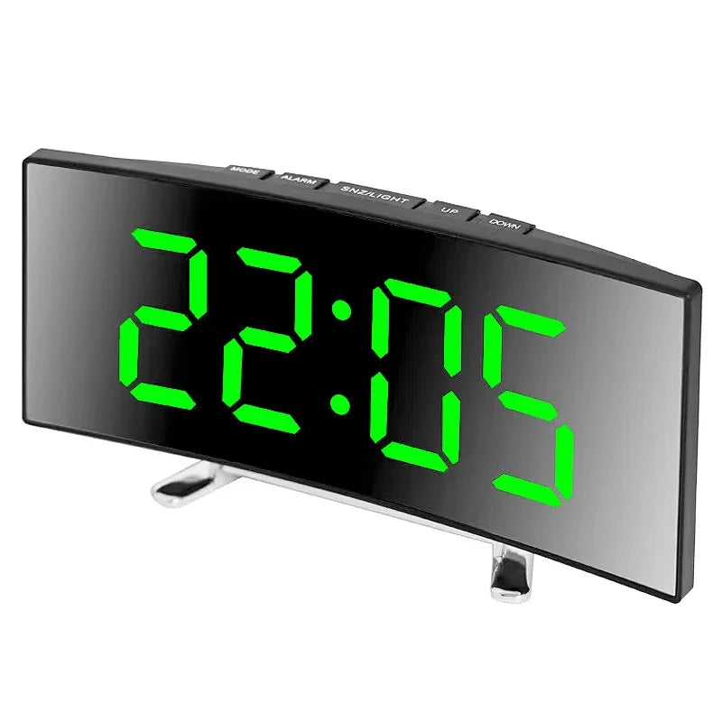 A digital LED alarm clock displaying 22:05 with buttons for alarm, sunlight, up, down, and down.
