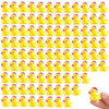 A set of glow-in-the-dark Christmas duck figurines wearing Santa hats.