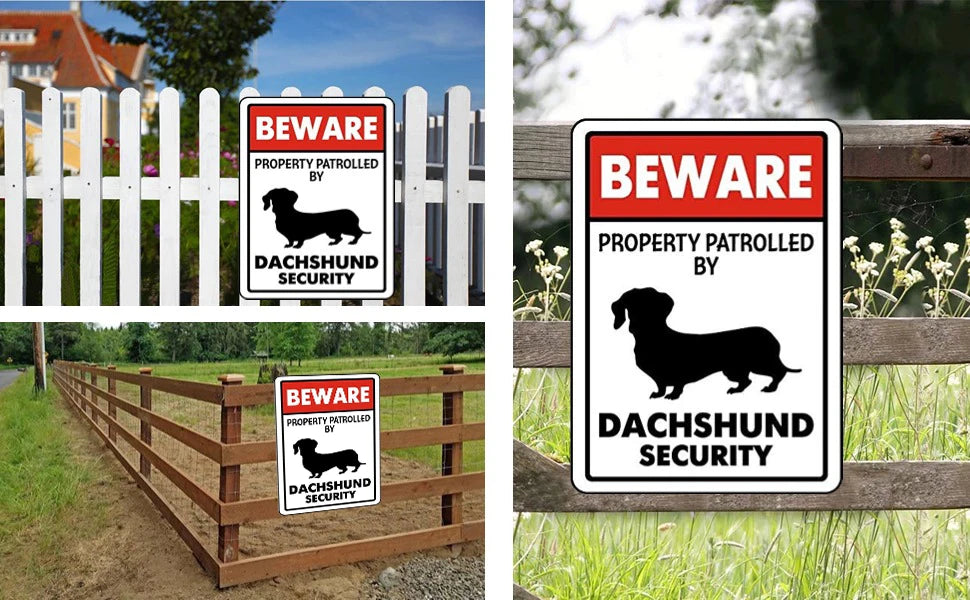 A set of durable metal tin signs warning to beware of property patrolled by a Dachshund security dog.