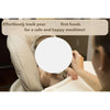 A person is tracking baby first foods for a safe and happy mealtime using a chart.