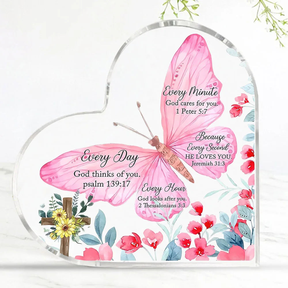 Pink butterfly design on a heart-shaped acrylic desk decor featuring inspirational Bible verses