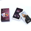 A box of the Mystic Black Rose Tarot Deck with several cards displayed next to a single card showing the word TERMS.