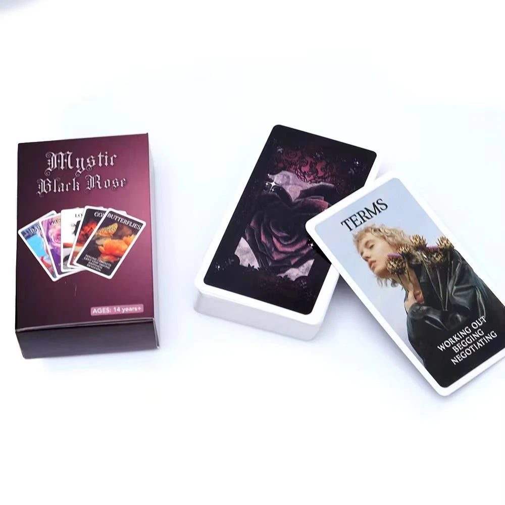 A box of the Mystic Black Rose Tarot Deck with several cards displayed next to a single card showing the word TERMS.