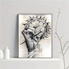 Black and white canvas wall art depicting a hand grasping a crown of thorns.