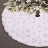 White faux fur Christmas tree skirt with silver snowflake pattern