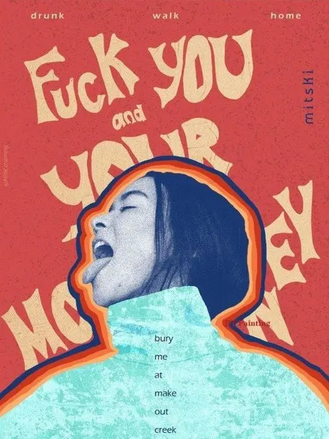 A red canvas print featuring a portrait of a woman with dark hair and an open mouth, with text elements like Fuck You and You