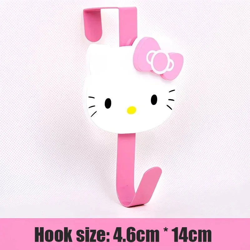 Pink cat-shaped over-the-door hook with a white head and pink ears for hanging storage