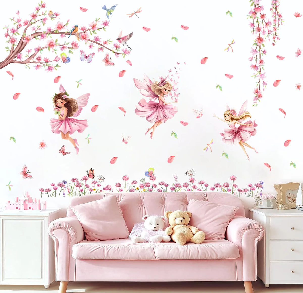Pink sofa decorated with butterfly and fairy wall decals featuring pink floral branches