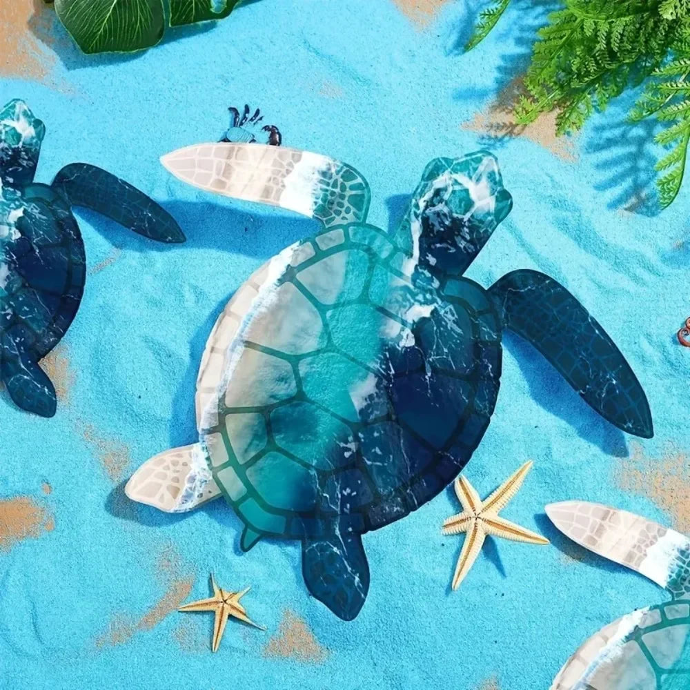 A blue and green turtle sculpture resting on a bright blue textured surface with green foliage in the background.