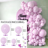 A large pink balloon arch display featuring various sizes of balloons and accessories for parties and showers.