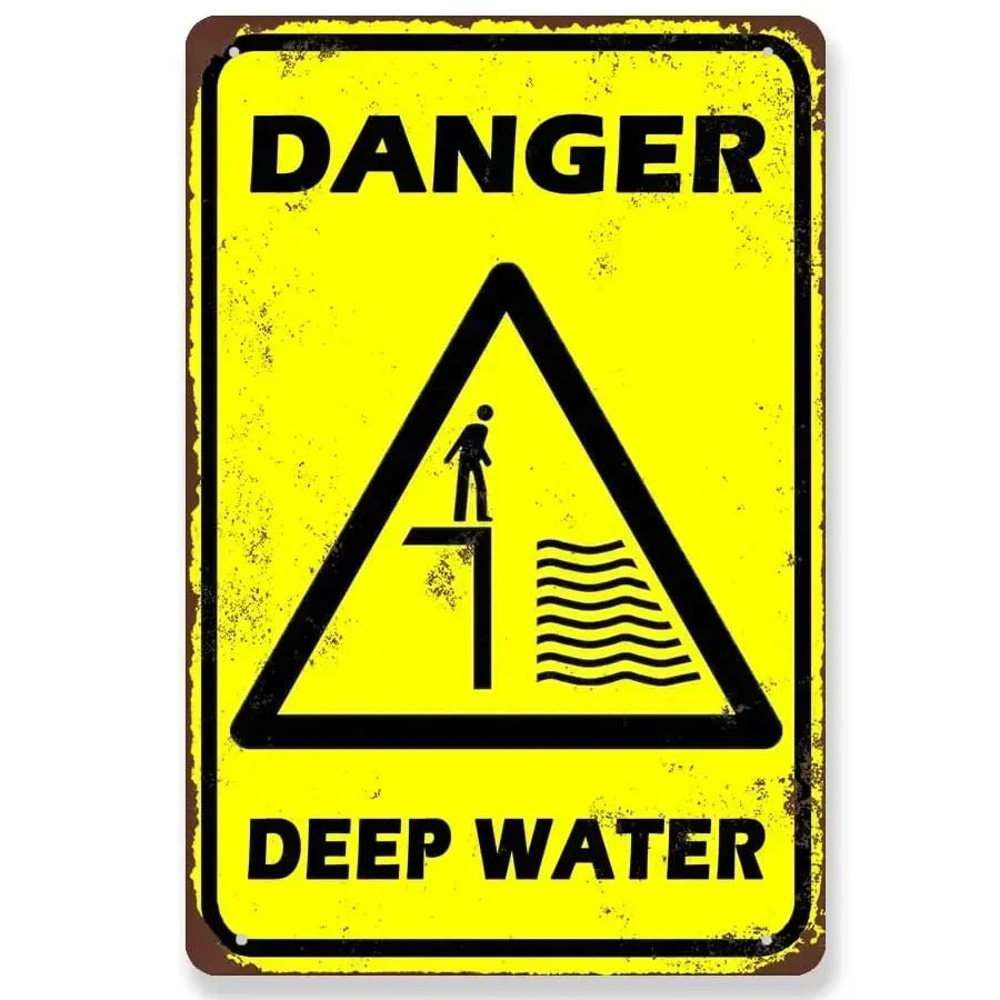 Vintage yellow and black warning sign indicating danger of deep water.