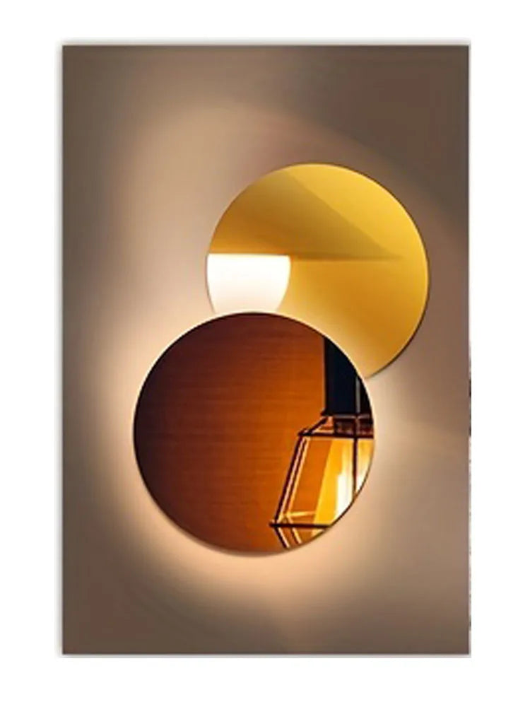 Modern geometric canvas wall art featuring a layered, circular light fixture with warm golden and amber tones.