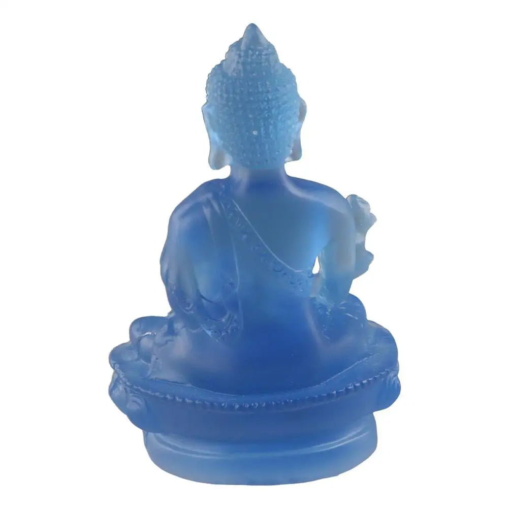 Blue resin statue of Medicine Buddha seated in meditation