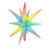 A star burst foil balloon featuring a gradient of pink, purple, blue, and yellow colors.