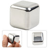 A square, polished stainless steel ice cube is shown from multiple angles.