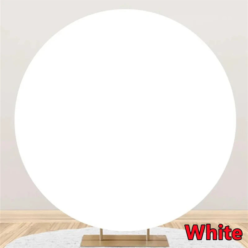 A round white photo backdrop with a wooden stand.