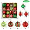 A set of 44 festive Christmas ornaments in various colors and designs including green red and gold finishes