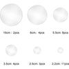 A collection of round, translucent 3D mirror wall decals in various sizes and quantities.