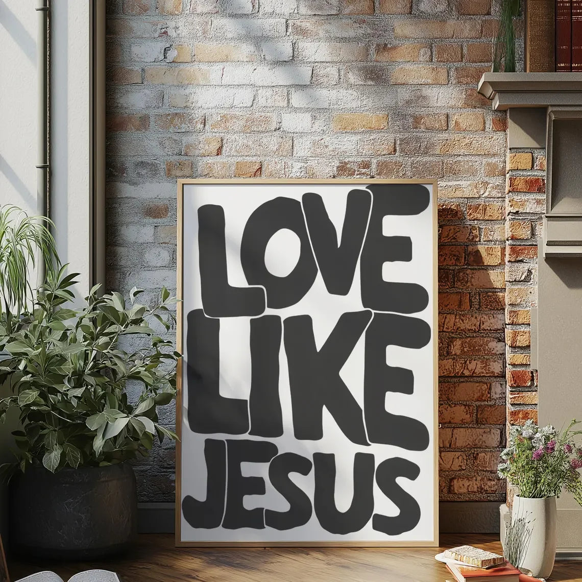 Black text on a white background featuring the phrase Love Like Jesus framed in light wood