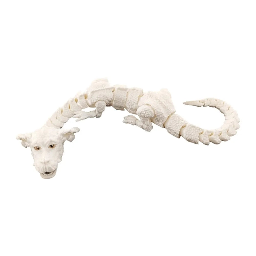 Figurine de dragon peinte à la main, corps et museau texturés de blanc.