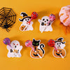 A collection of Halloween-themed lollipop holder cards featuring ghosts and witches on white backgrounds.