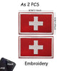 Two red embroidered medical cross patches with white borders and stitching