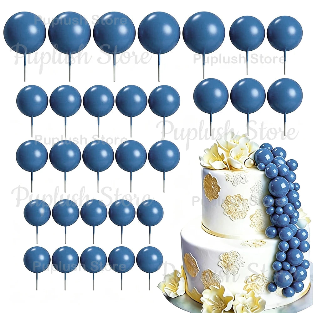 A set of blue and white foam cake toppers, including round discs and a grape cluster arrangement.