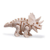 A light pink 3D printed figurine of a dinosaur skeleton, featuring a T-Rex and Mosasaurus.