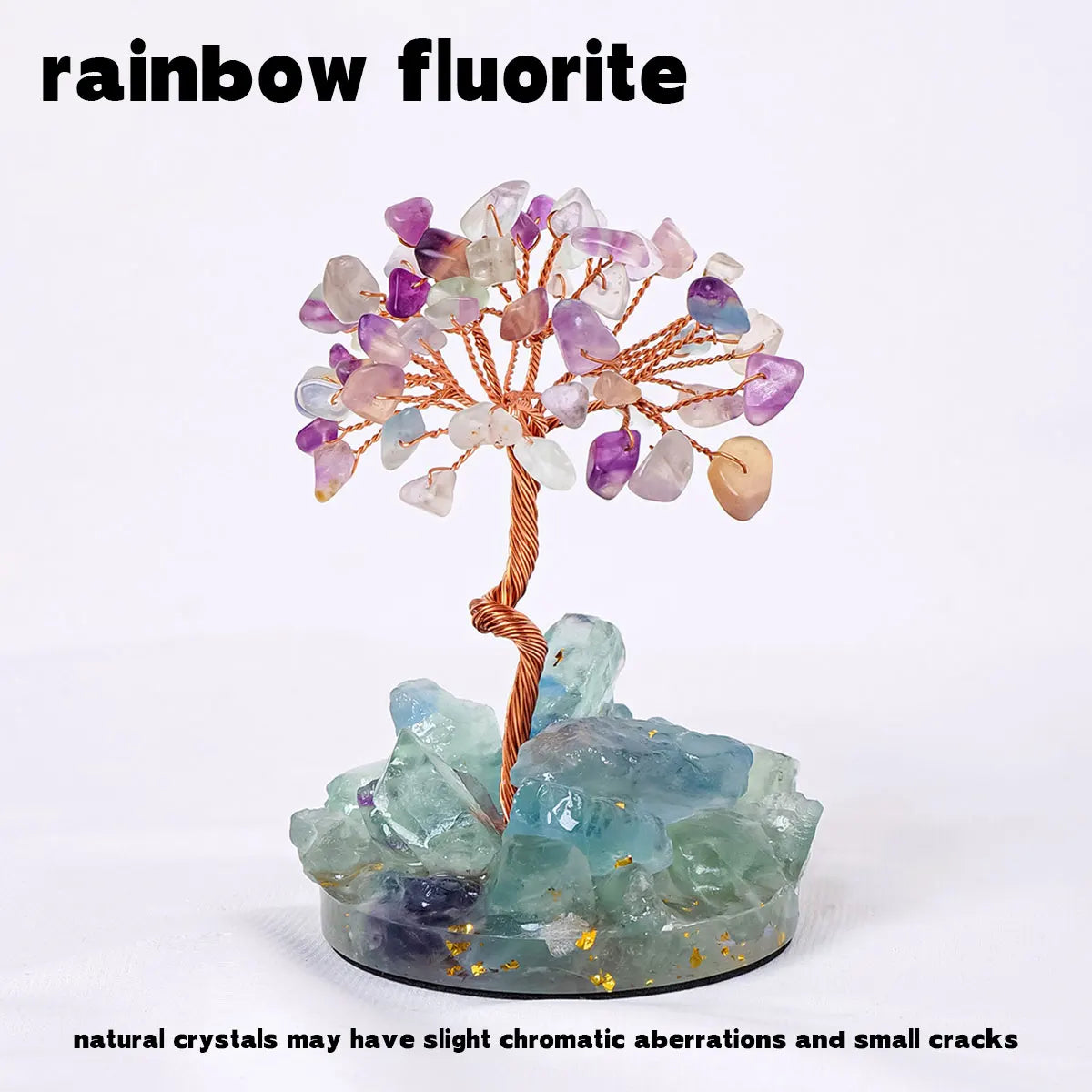 A rainbow fluorite crystal tree with purple and pink crystals growing from a large blue-green crystal base.