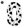 A white foil balloon shaped like the number zero with a black cow print pattern.