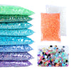 A collection of colorful resin rhinestones in various shades and sizes for crafting projects.