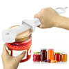 A hand is using a white ergonomic jar and bottle opener set to open a red glass jar.
