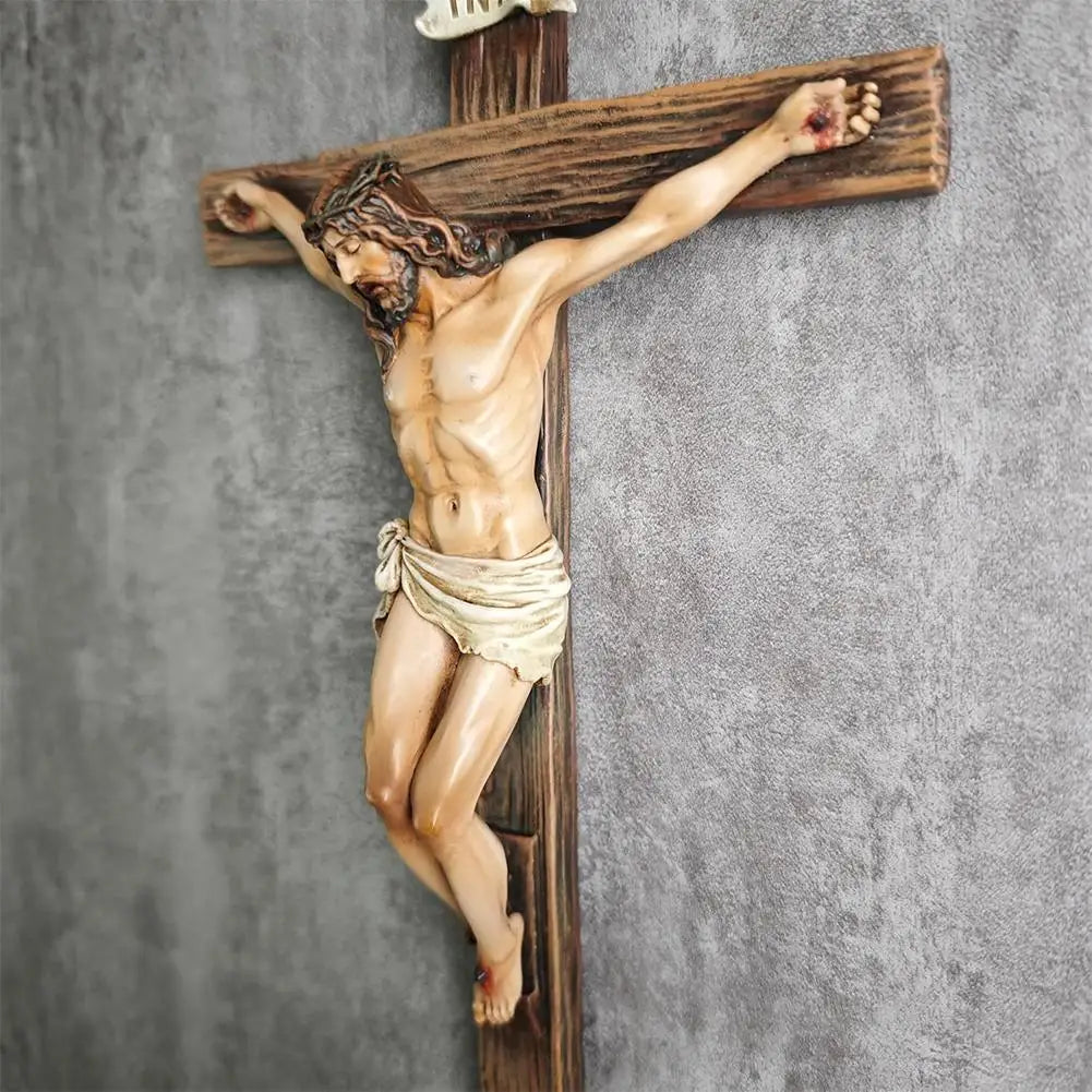 Hand-painted resin statue of Jesus on a wooden cross for home decor