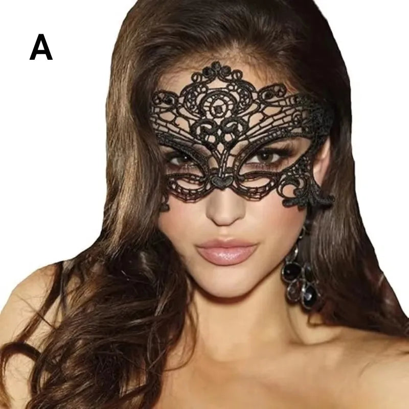A model wears an elegant black lace masquerade mask with dangling earrings against a dark background.
