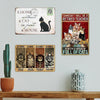 A set of three vintage metal signs featuring cats and funny quotes about cats and houses