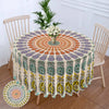 Bohemian peacock mandala round tablecloth with floral patterns displayed on a wooden table.