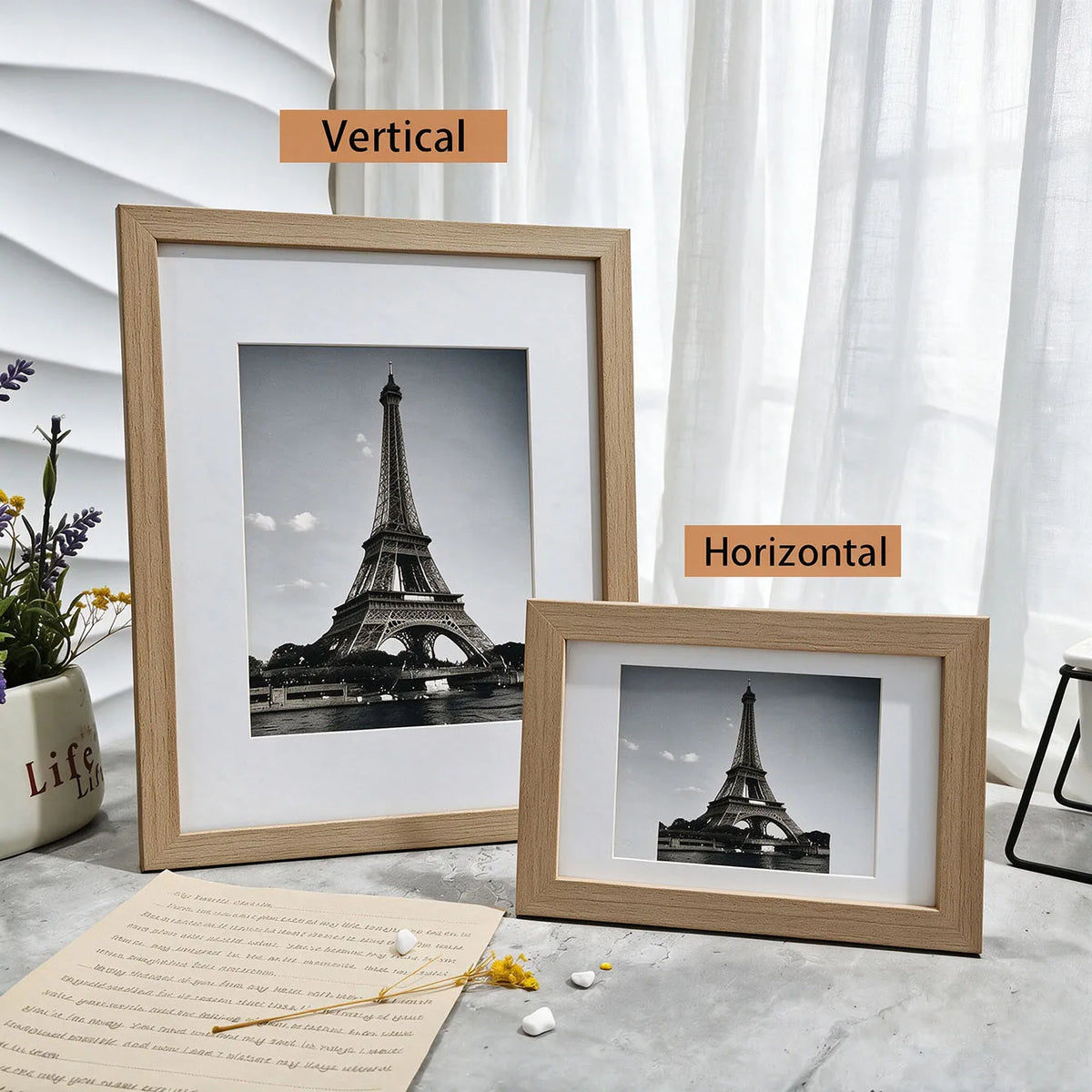 A vertical and horizontal set of rustic wooden photo frames displaying images of the Eiffel Tower.