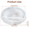 A round, distressed white wooden serving tray with visible grain and texture.