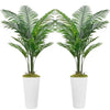 Artificial palm tree floor decor featuring lush green fronds.