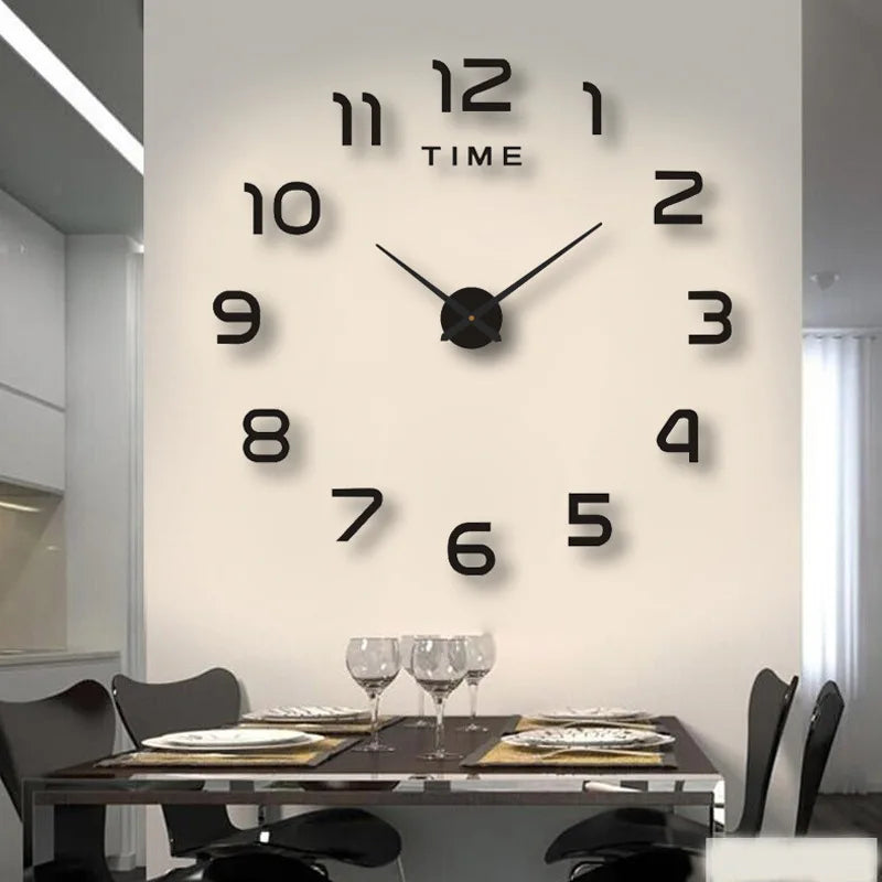 A modern wall clock with black numbers and hands displaying the time, mounted on a light-colored wall above a dark table.