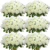 A bouquet of white artificial silk roses arranged for table decor.